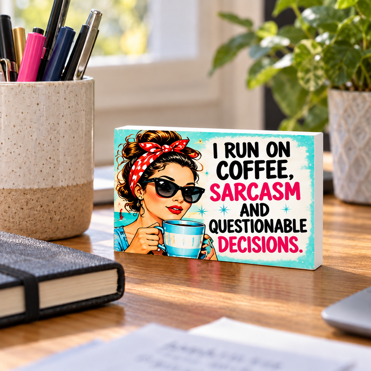 I Run on Coffee, Sarcasm and Questionable Decisions mini sign standing on a desk.