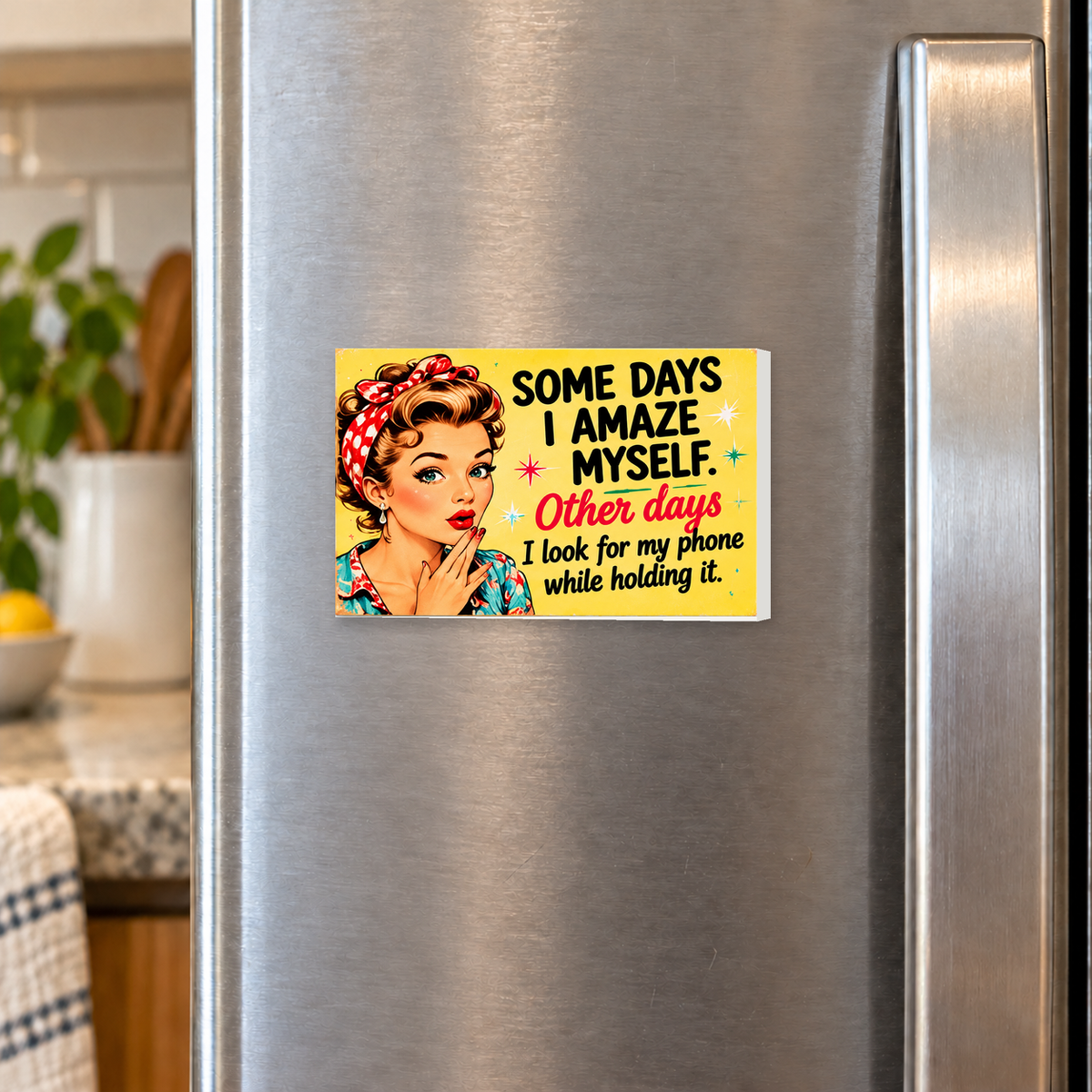 Some Days I Amaze Myself. Other Days I Look for My Phone While Holding It rectangular magnet shown front-facing on a refrigerator.