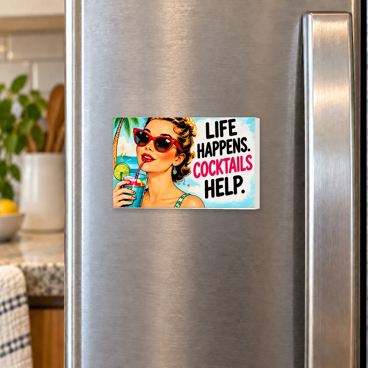 Life Happens. Cocktails Help rectangular magnet shown front-facing on a refrigerator.