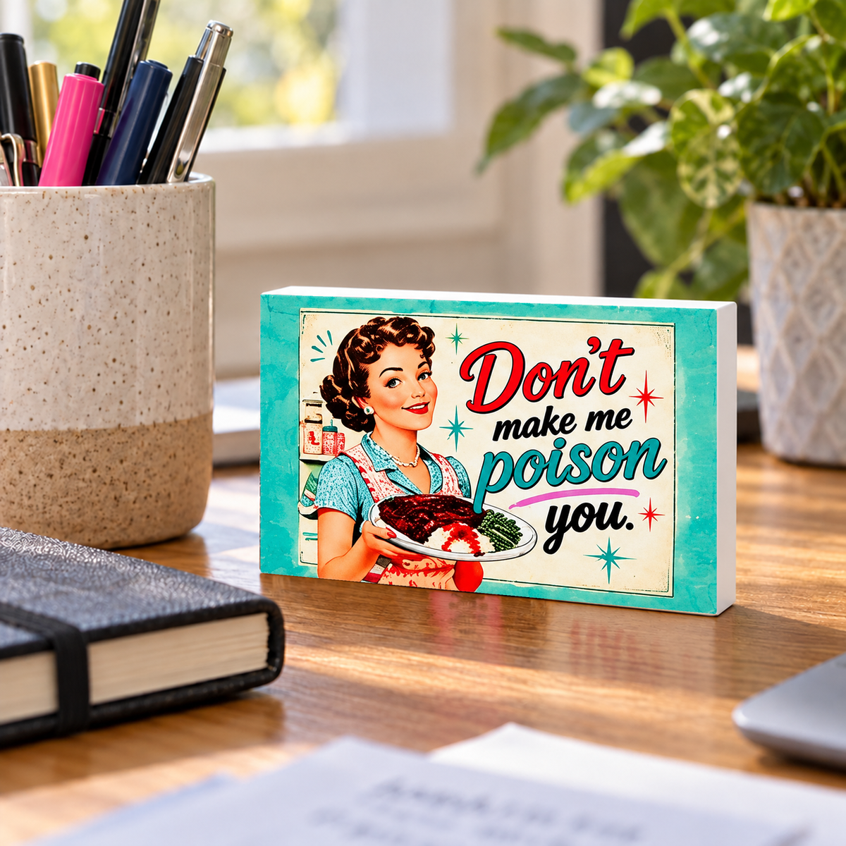 Don't Make Me Poison You rectangular mini sign standing on a desk with white PVC edges.