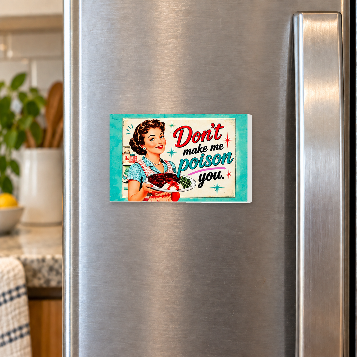 Don't Make Me Poison You rectangular magnet shown front-facing on a refrigerator.