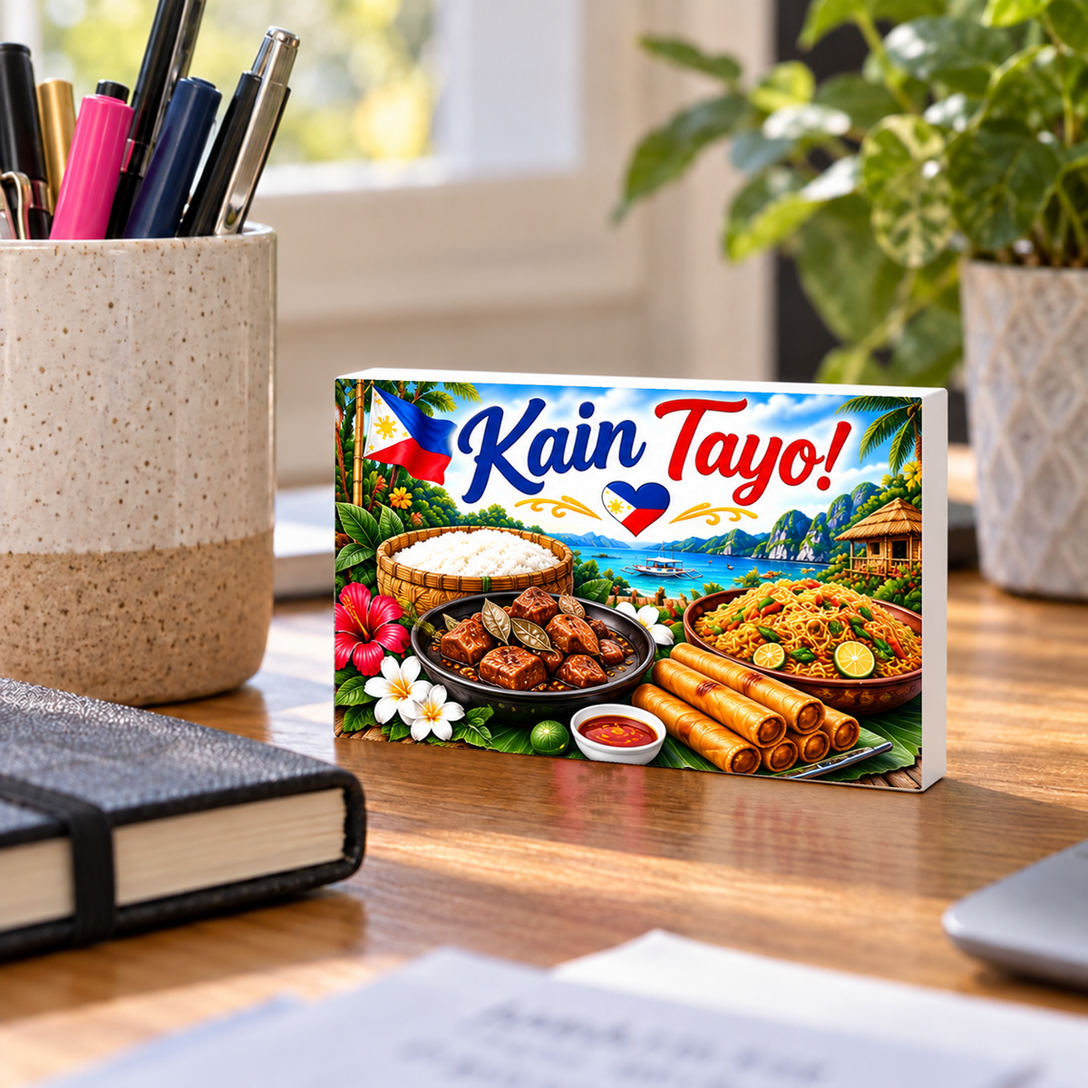 Kain Tayo Filipino Food rectangular mini sign standing on a desk with white PVC edges.