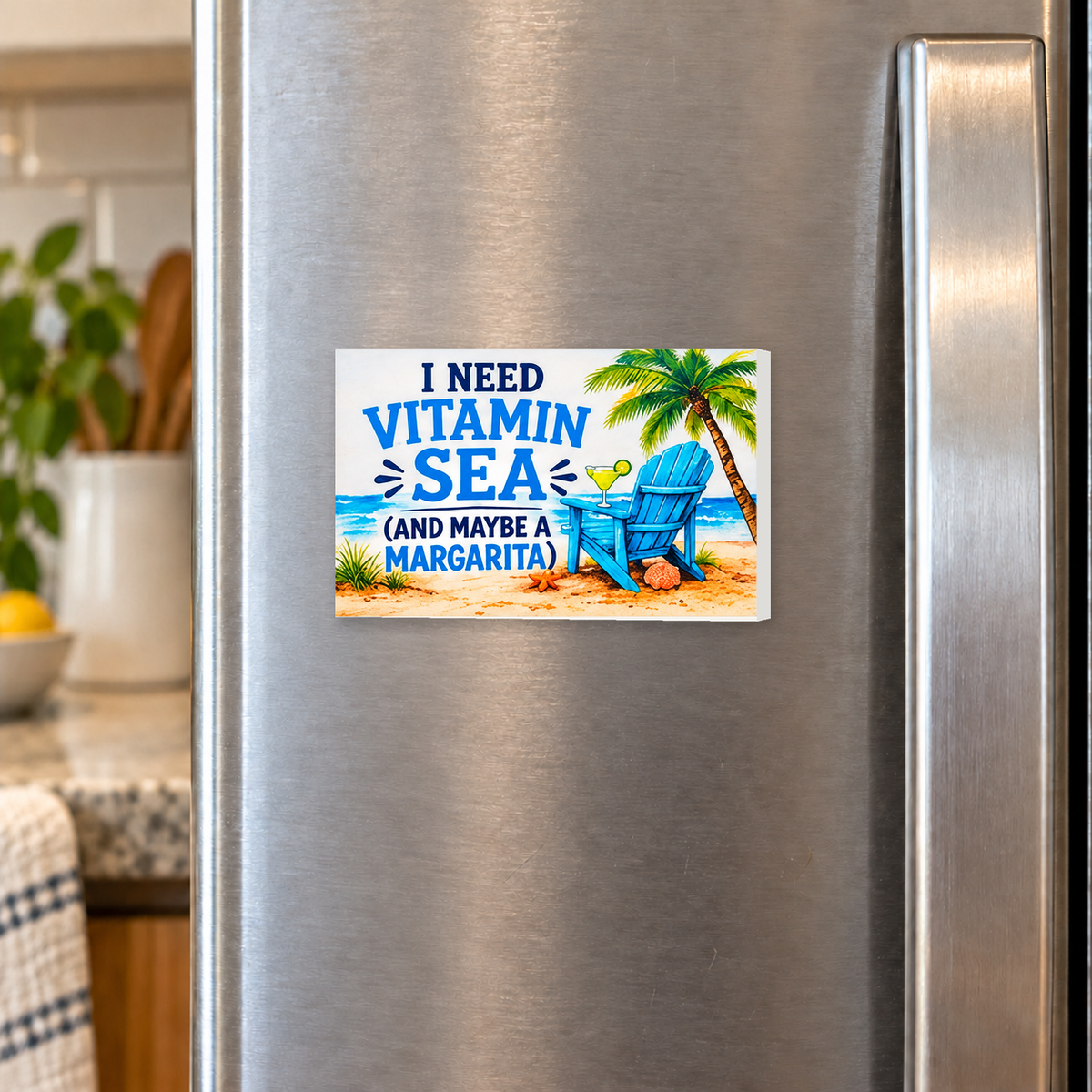 I Need Vitamin Sea (And Maybe a Margarita) rectangular magnet on a refrigerator.