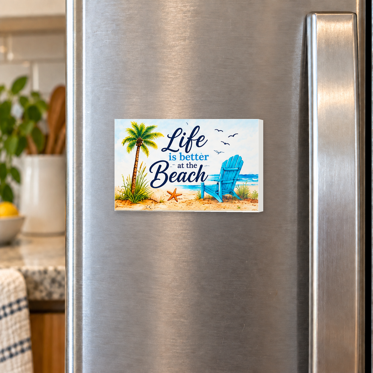 Life Is Better at the Beach rectangular magnet shown front-facing on a refrigerator.