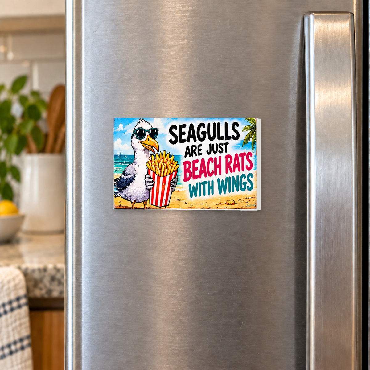Seagulls Are Just Beach Rats With Wings rectangular magnet shown front-facing on a refrigerator.
