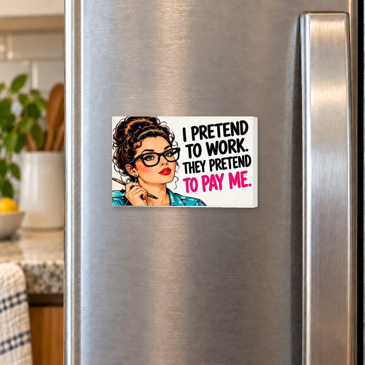 I Pretend to Work They Pretend to Pay Me rectangular magnet on a refrigerator.