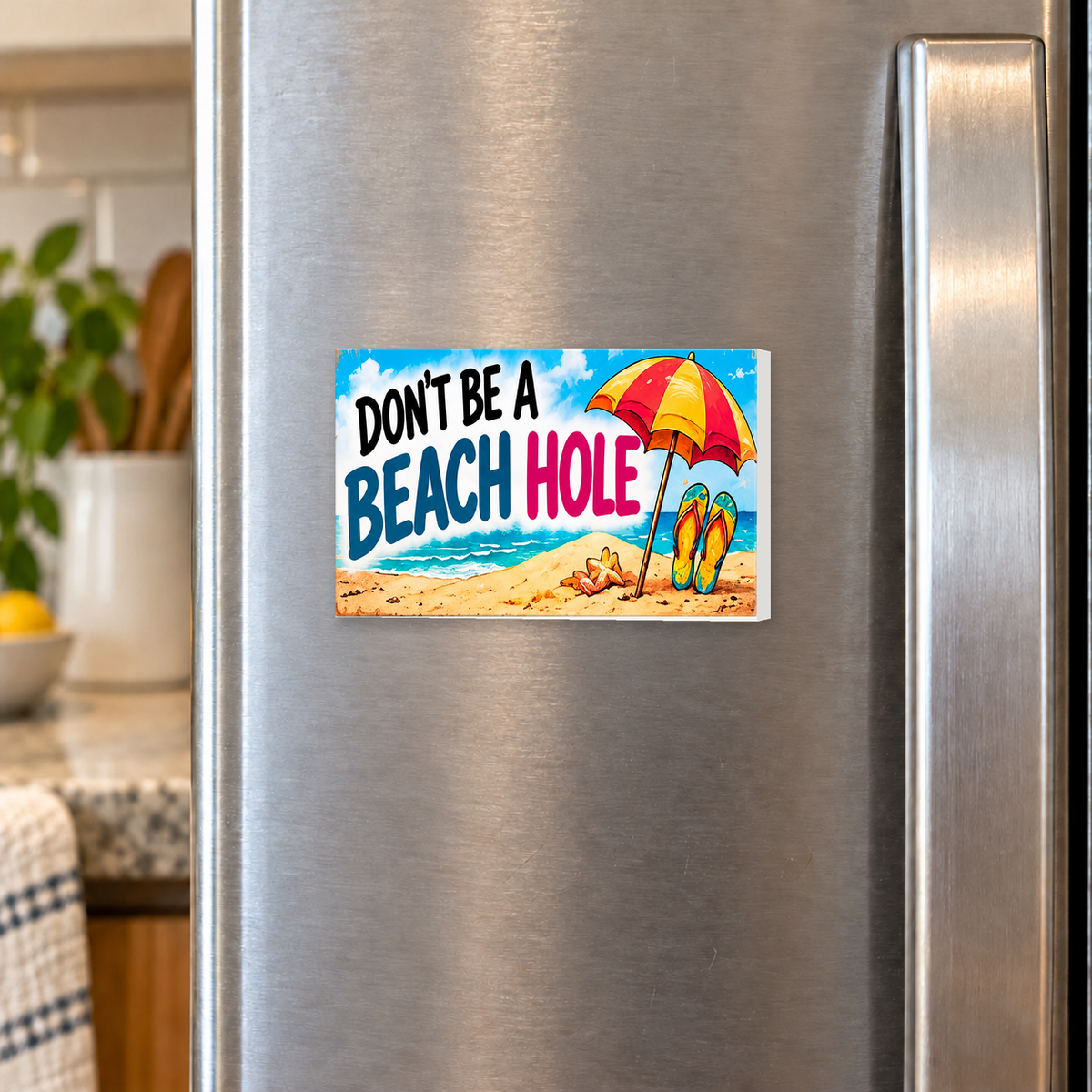 Don't Be a Beach Hole rectangular magnet shown front-facing on a refrigerator.