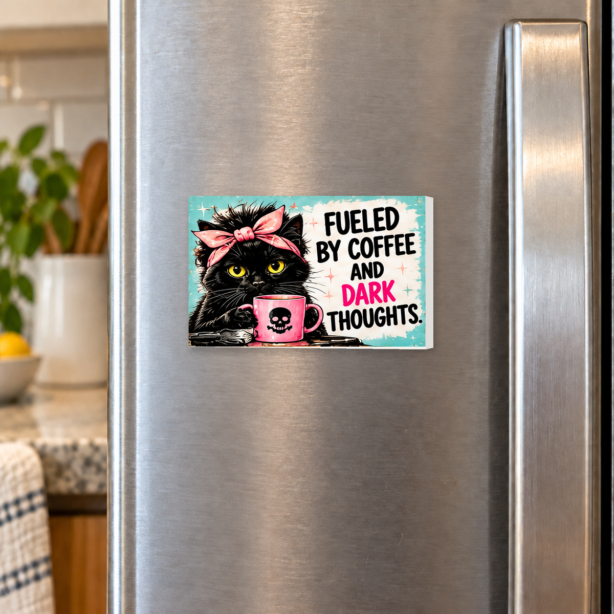 Fueled by Coffee and Dark Thoughts rectangular magnet shown front-facing on a refrigerator.
