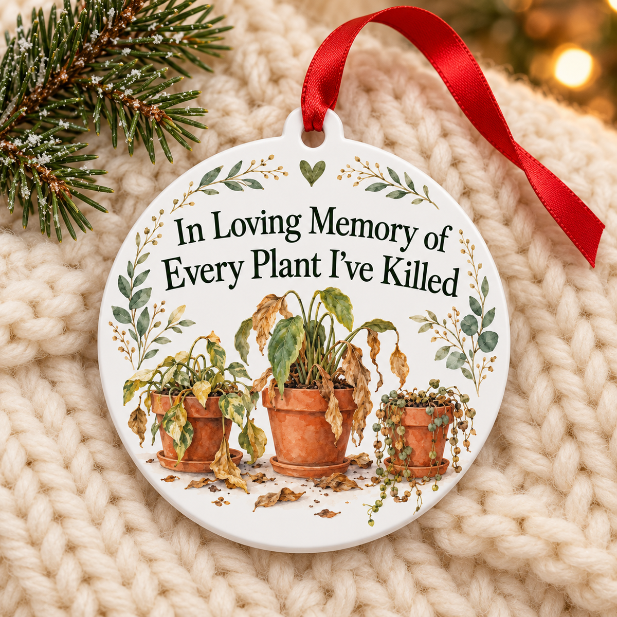 In Loving Memory of Every Plant I've Killed Ornament – Funny Houseplant Gift on cream knit blanket