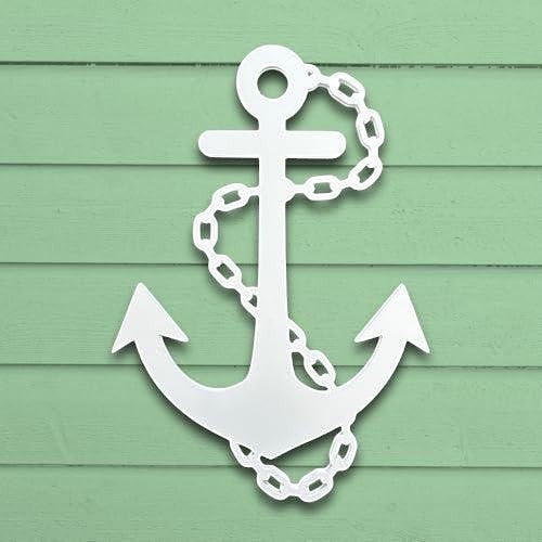 white PVC nautical anchor wall decor with chain detail on green wooden siding