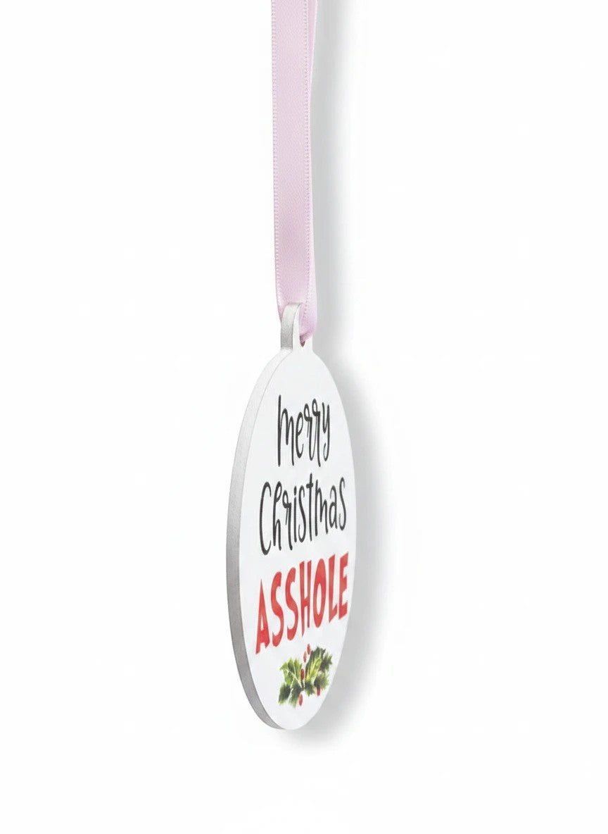 FUN HAPPY STUFF by jennygems white oval Christmas ornament with funny text and holly hanging from a pink ribbon