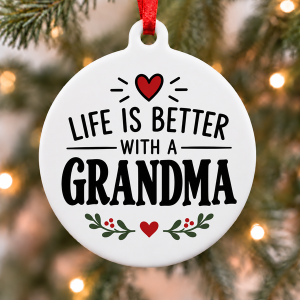 White round Christmas ornament reading Life Is Better With a Grandma with a red heart and green leafy accents