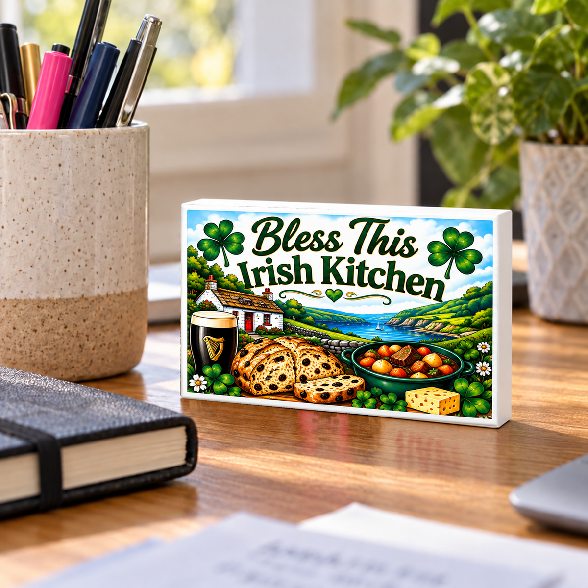 Bless This Irish Kitchen rectangular mini sign standing on a desk with white PVC edges.