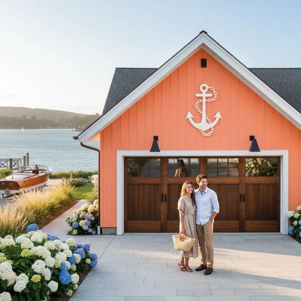 white pvc nautical anchor wall decor monted on coastal home exterior with couple