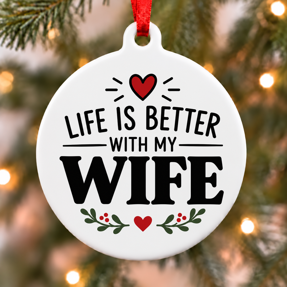 Life Is Better With My Wife white PVC Christmas ornament close up on a tree with red ribbon