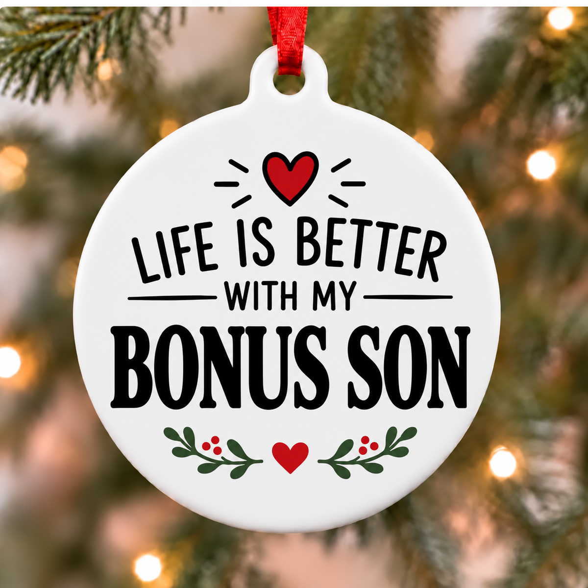 Life Is Better With My Bonus Son white PVC Christmas ornament close up on a tree with red ribbon